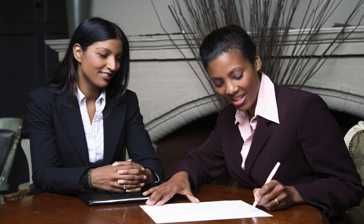 Picture of 2 people having an appraisal convesration
